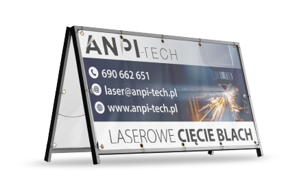 Baner reklamowy na stojaku, ciemne tło, efekty świetlne. Baner cięcia laserowego blach.