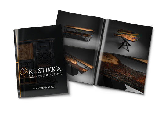 Katalog meblowy, okładka i rozłożone strony. Ciemne tło, meble drewniane i metalowe.